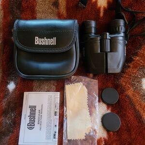 Bushnell Powerview 7-15 × 25 Compact Zoom Binoculars With Case And Accesories.